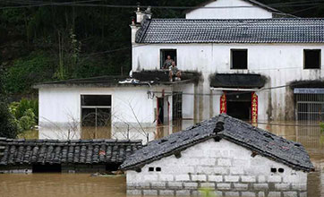 More Chinese regions up flood response levels